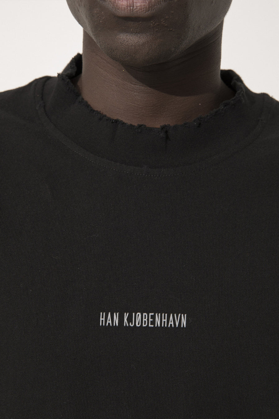 Buy the Han Kjobenhavn Distressed Logo T-Shirt in Black at Intro. Spend £50 for free UK delivery. Official stockists. We ship worldwide.