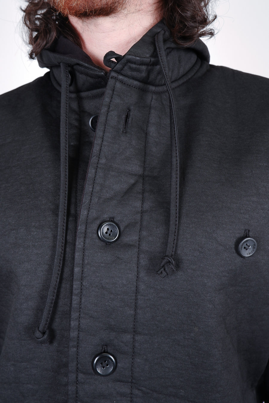 Buy the Hannes Roether Waxed Cotton Button-Up Hoodie in Black at Intro. Spend £50 for free UK delivery. Official stockists. We ship worldwide.