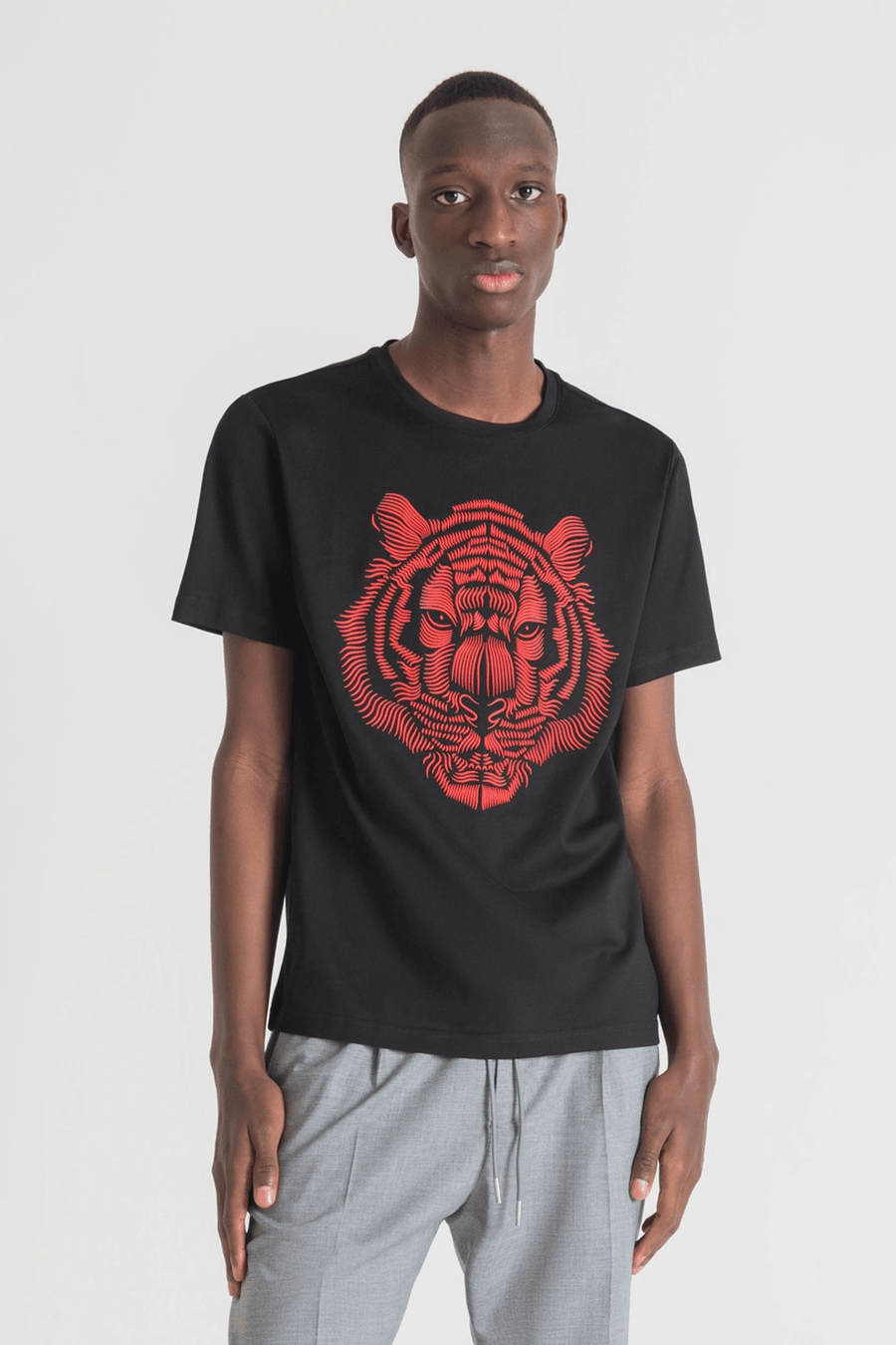 Buy the Antony Morato Slim Fit Tiger Print T-Shirt in Black/Red at Intro. Spend £50 for free UK delivery. Official stockists. We ship worldwide.
