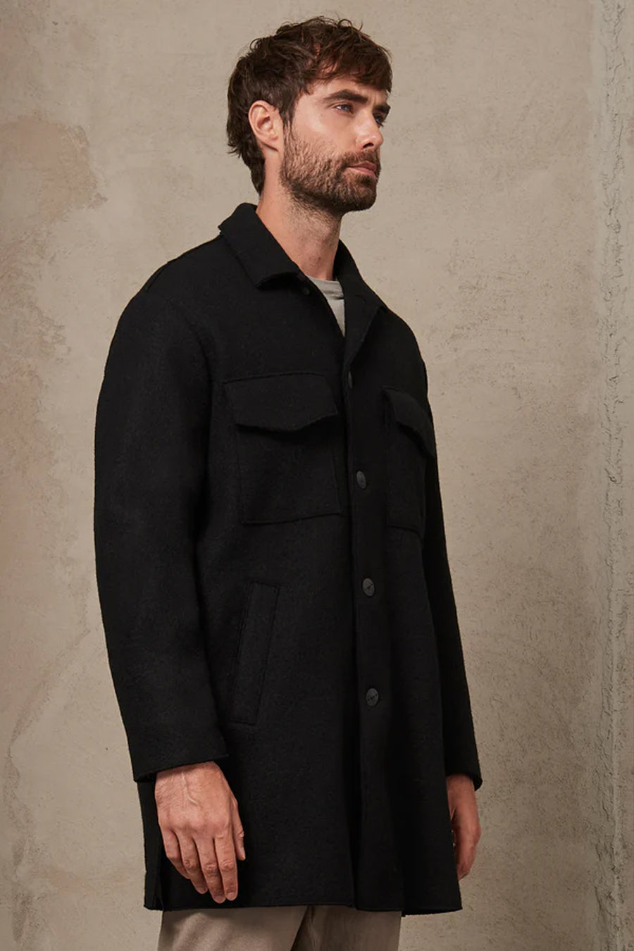 Buy the Transit Loose Fit Raw Cut Wool Coat Black at Intro. Spend £50 for free UK delivery. Official stockists. We ship worldwide.